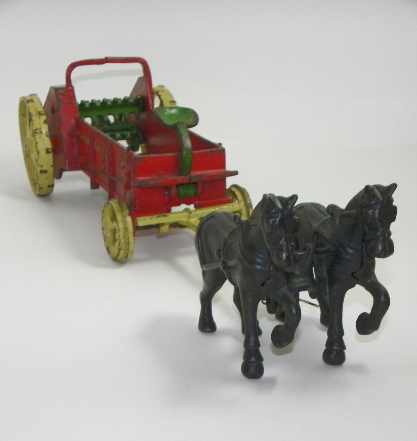 old cast iron john deere tractor