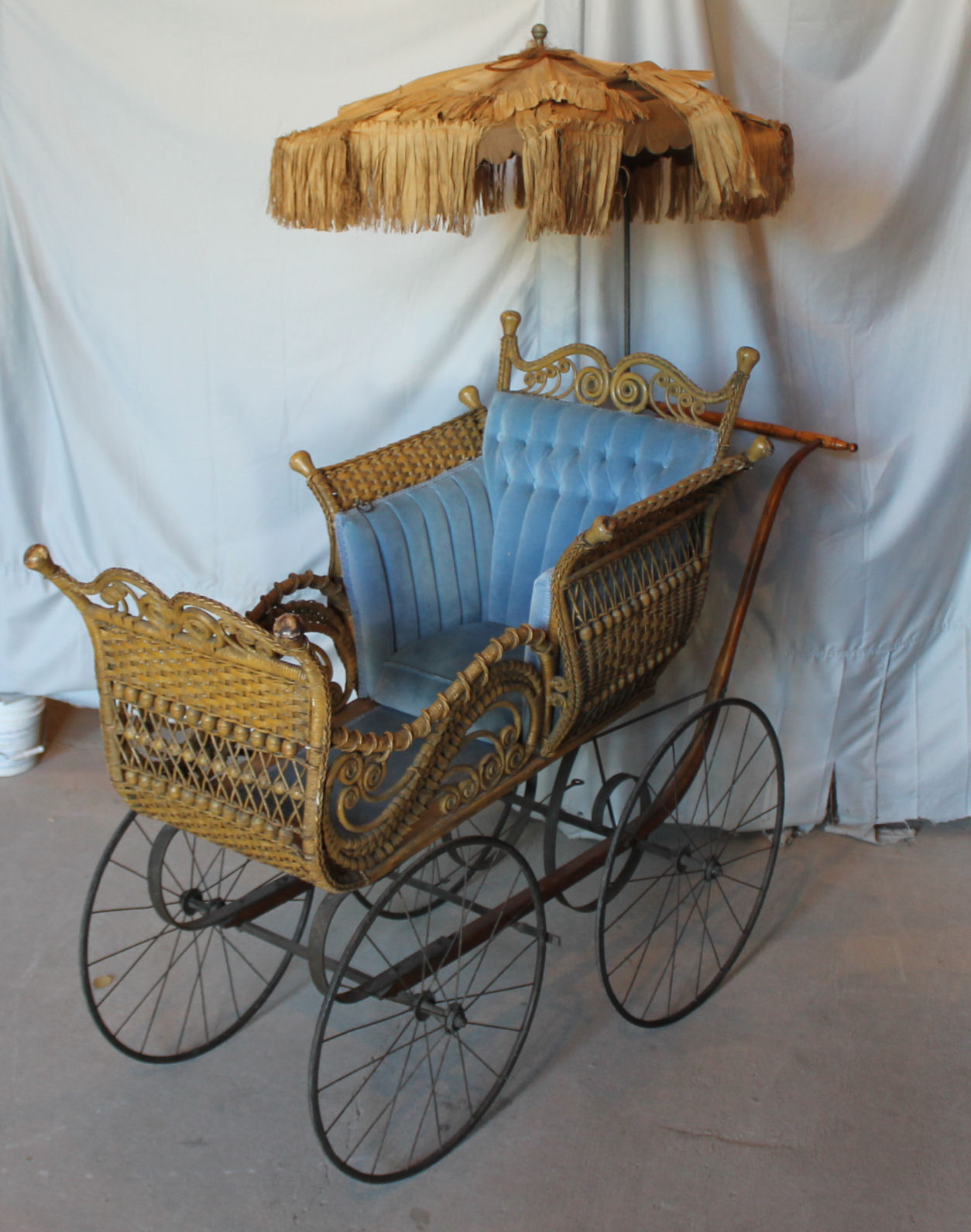 antique wicker baby carriage