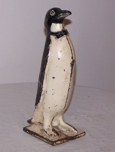 Bargain John's Antiques | Antique Penguin Standing Door Stop Cast Iron ...